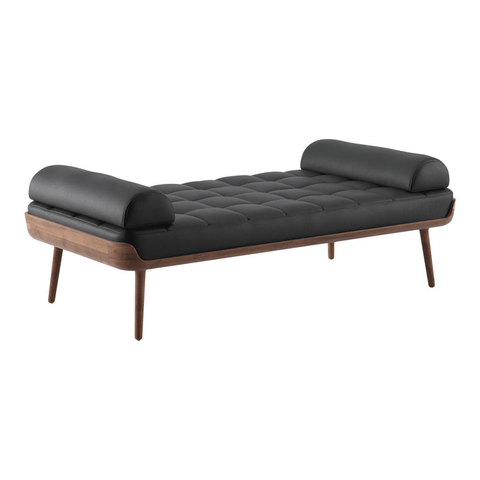 Black upholstered daybed with tufted pattern and wooden legs. Modern design with rounded armrests for added comfort.