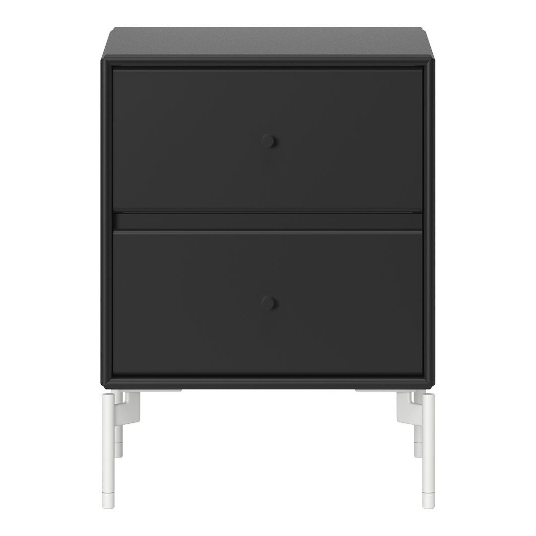 Sleek black nightstand with minimalist white legs and smooth, matte finish. Perfect for modern decor.