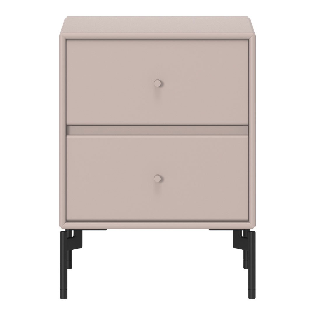 Blush pink nightstand with minimalistic design and black metal legs, featuring two smooth drawers and round knobs.