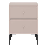 Blush pink nightstand with minimalistic design and black metal legs, featuring two smooth drawers and round knobs.