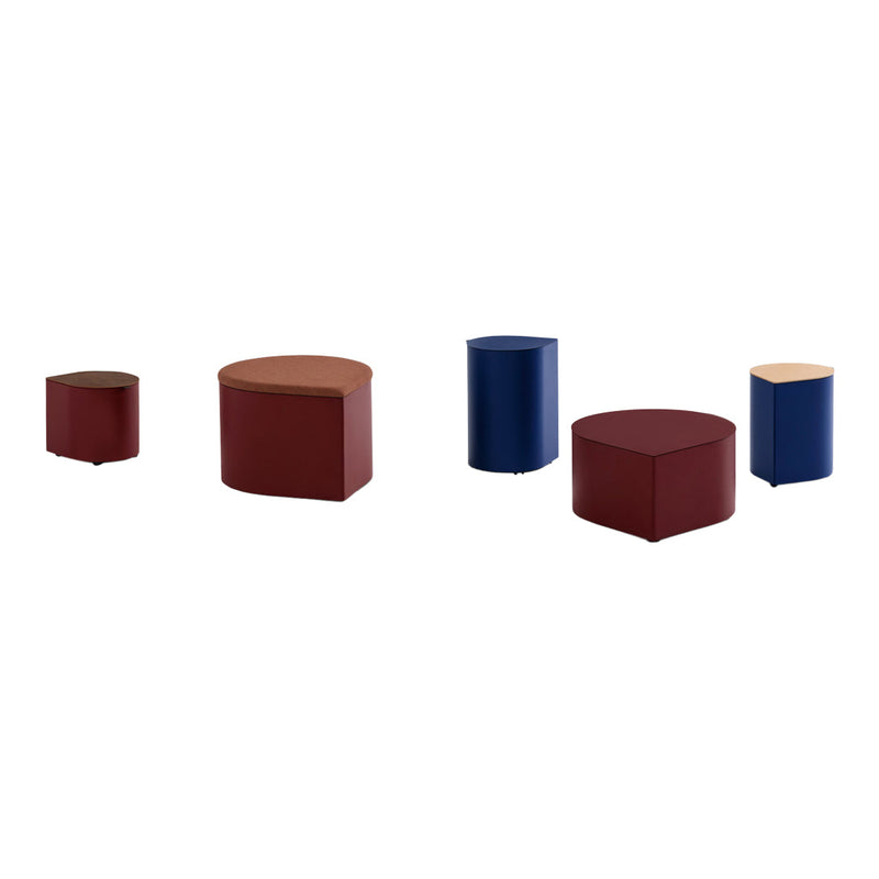 Set of colorful geometrically shaped tables in burgundy, navy blue, and light brown. Modern minimalistic design.