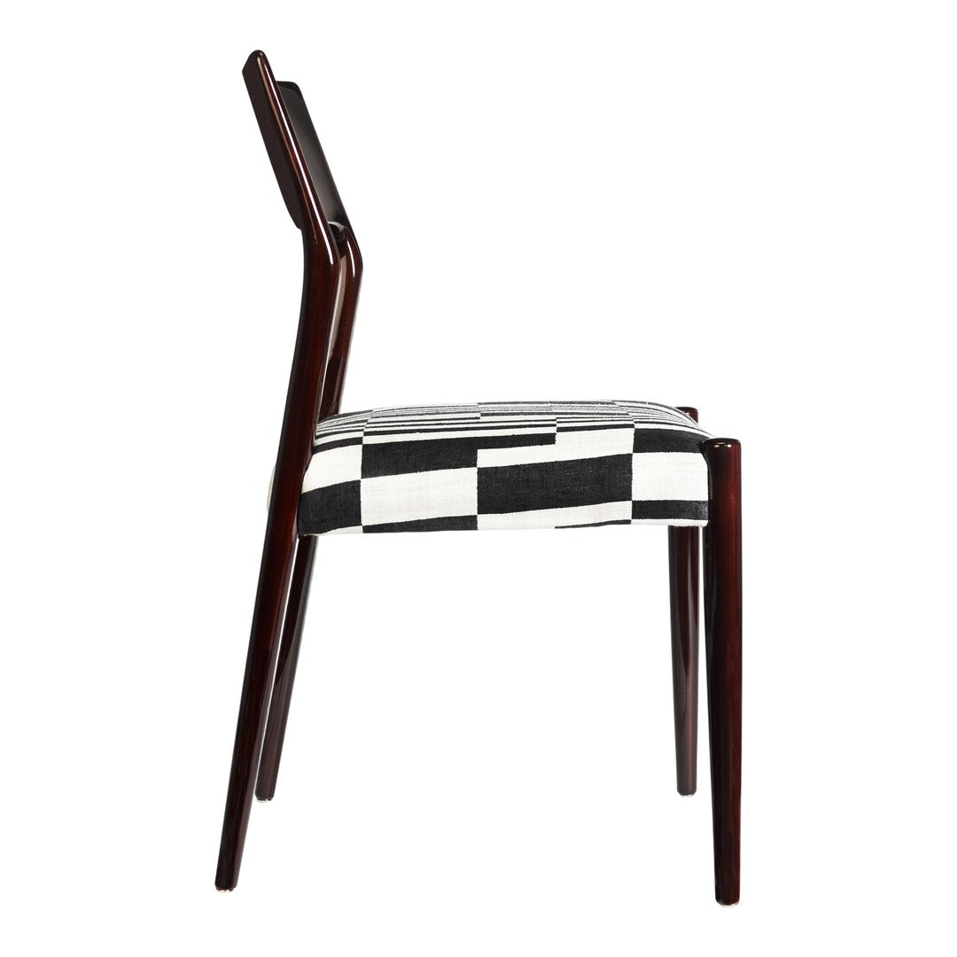 Black and white checkered upholstery on a wooden chair, featuring a sleek, modern silhouette.