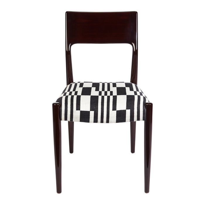 Black and white patterned upholstery chair with dark wood frame, featuring a geometric design.