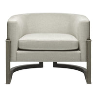 Light beige upholstered armchair with subtle texture and sleek black metal base, featuring nailhead trim detail.