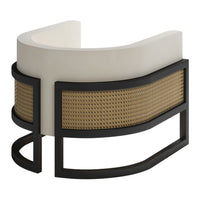 Curved cream and black accent table with woven cane pattern, adding a touch of modern elegance to any space.