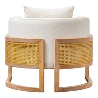 White upholstered chair with natural wood and contrasting woven cane details, featuring a plush cushion.