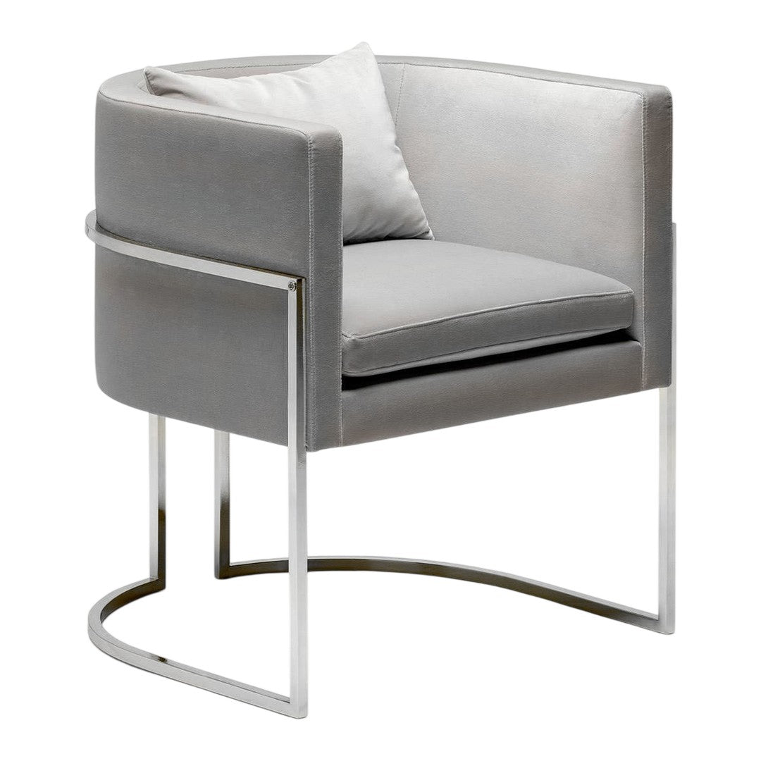 Modern gray velvet accent chair with a sleek silver frame, featuring a solid cushion and subtle textures.