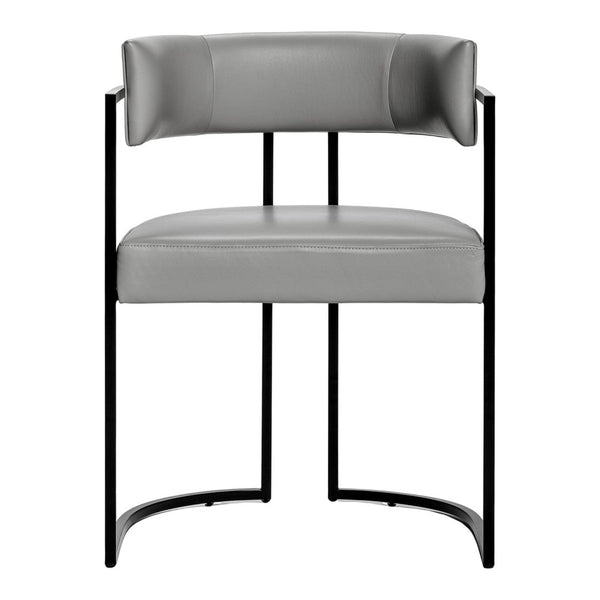 Gray upholstered chair with curved backrest and black metal frame, showcasing a modern, minimalist design.
