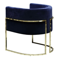 Luxurious navy velvet chair with a sleek gold metal base and studded detailing, offering modern elegance.