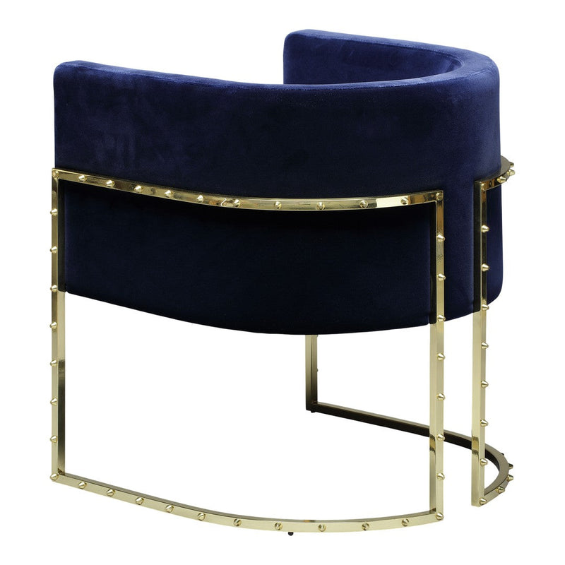 Luxurious navy velvet chair with a sleek gold metal base and studded detailing, offering modern elegance.