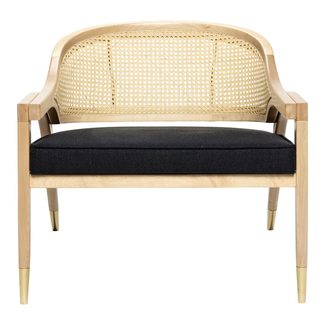 Natural wood chair with woven cane back, featuring a black cushion and gold-tipped legs. Elegant and modern design.