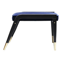 Black and gold accent chair with a luxurious blue velvet cushion, featuring a sleek, modern design.