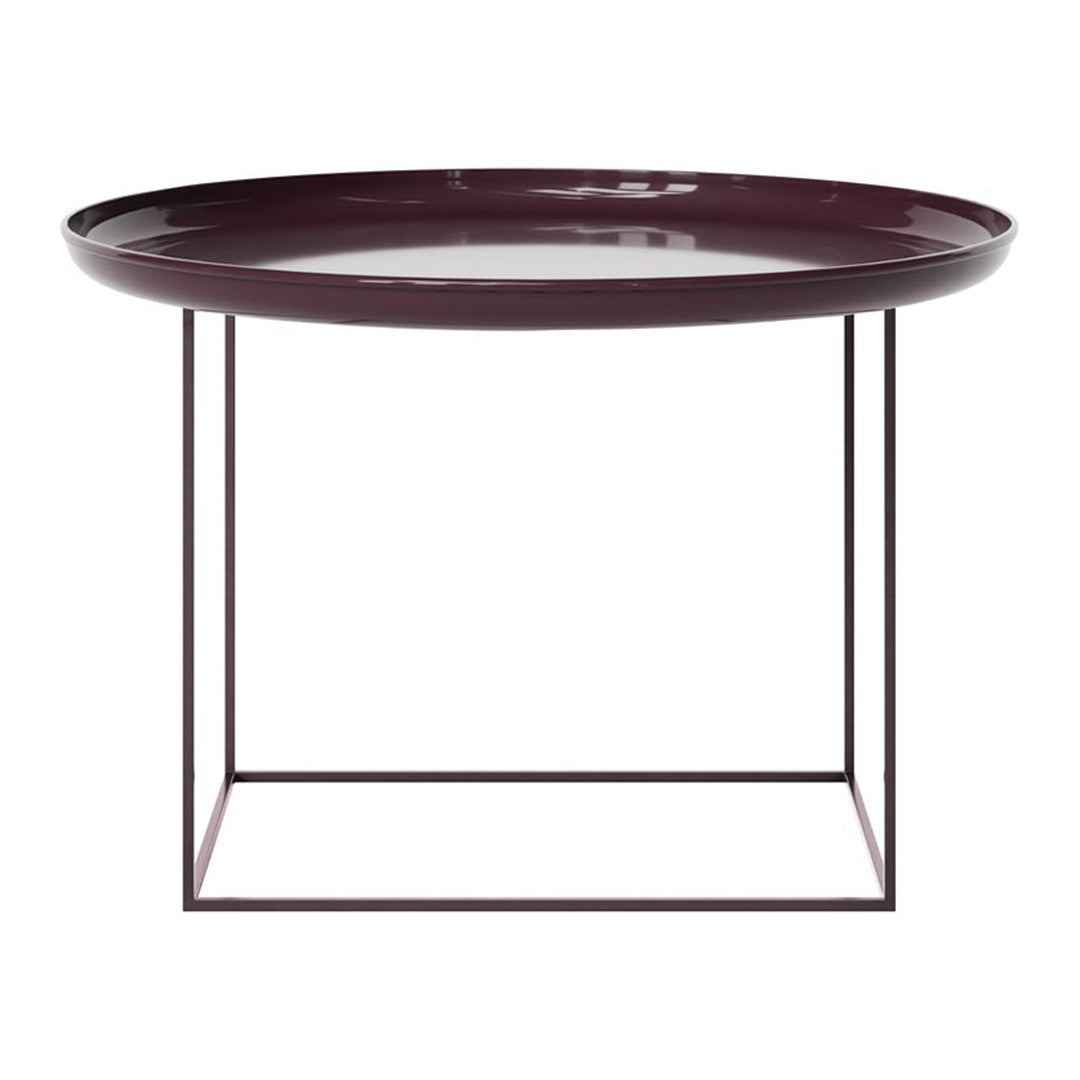 Burgundy round tray table with sleek metal base, featuring a minimalist design. Ideal for modern decor.