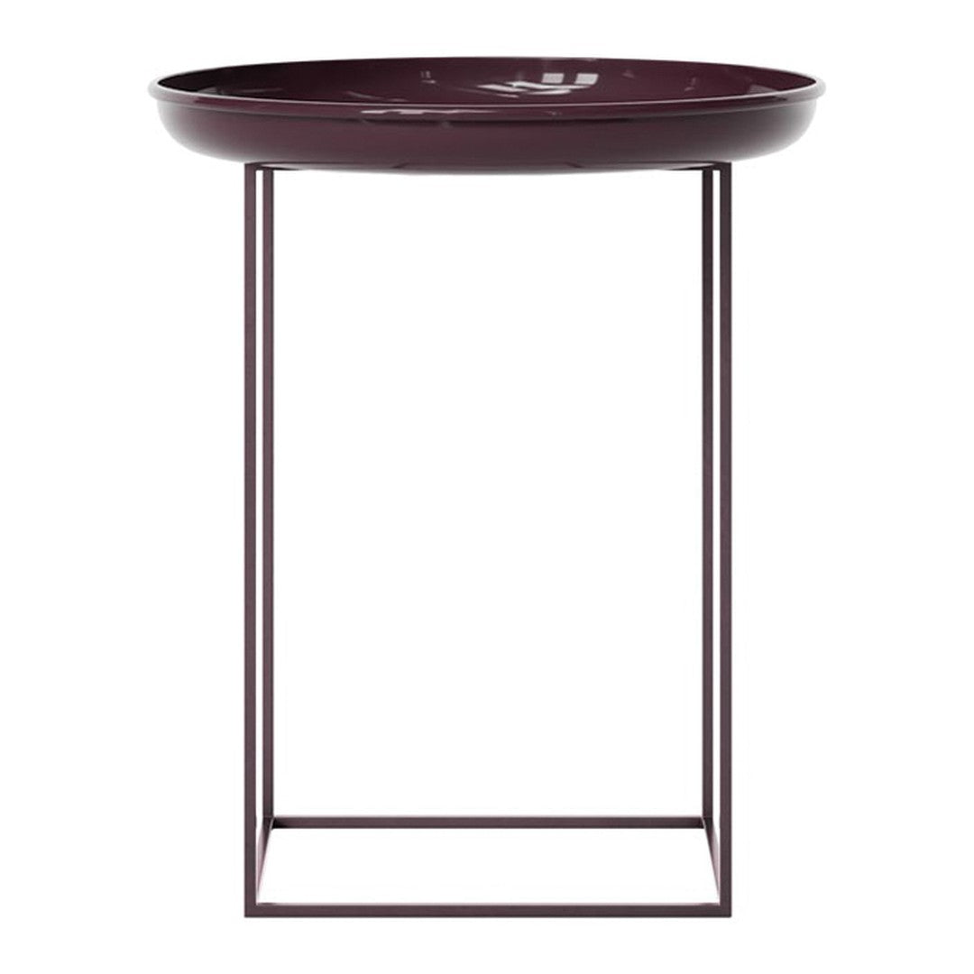 Burgundy round table with a minimalist black metal base, featuring a smooth, glossy finish. Perfect for modern decor.