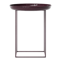 Burgundy round table with a minimalist black metal base, featuring a smooth, glossy finish. Perfect for modern decor.