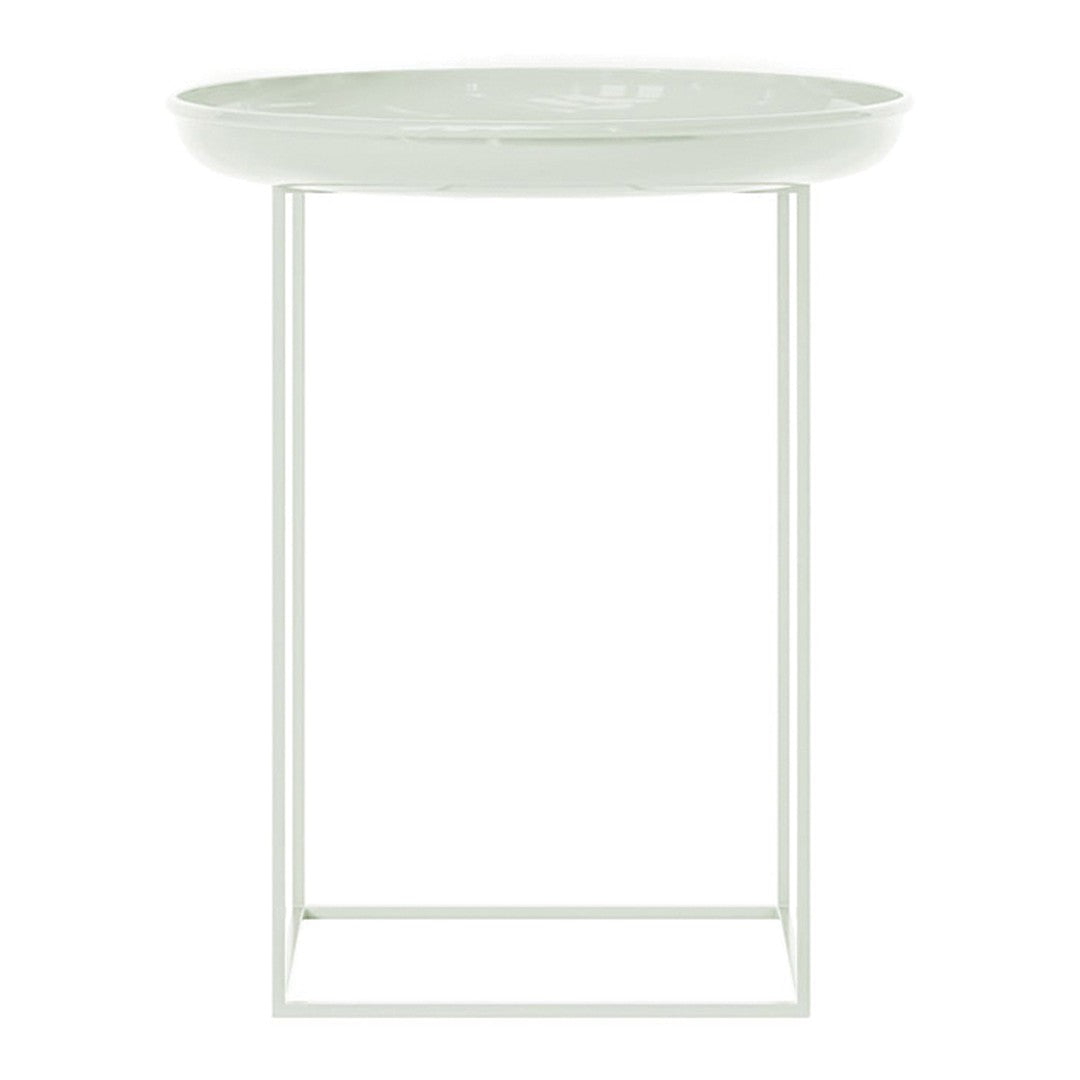 Round white tray table with a minimalist design and a sleek white metal frame. Ideal for modern decor.
