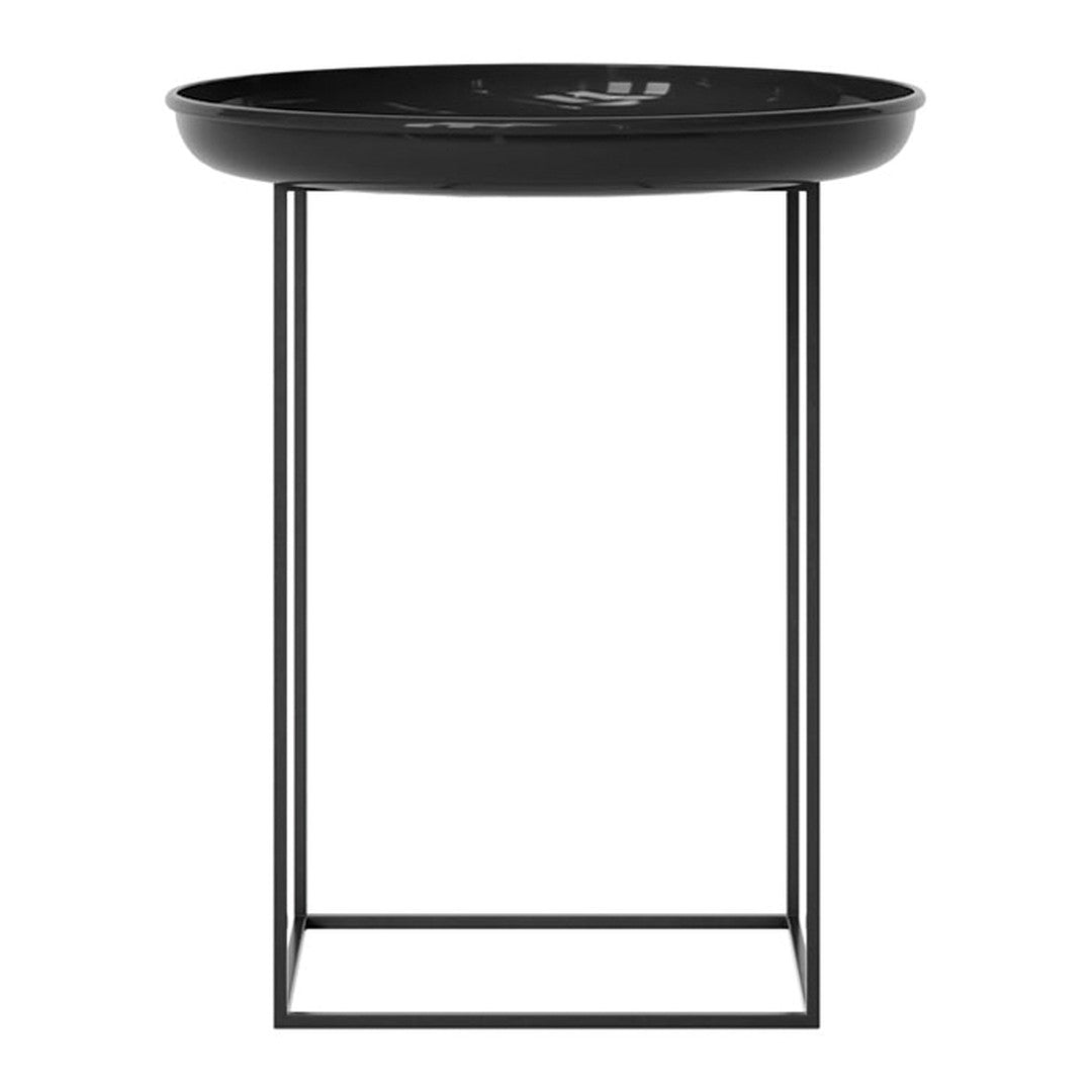 Black round tabletop with minimalist black metal base, featuring simple, sleek design. Ideal for modern decor.