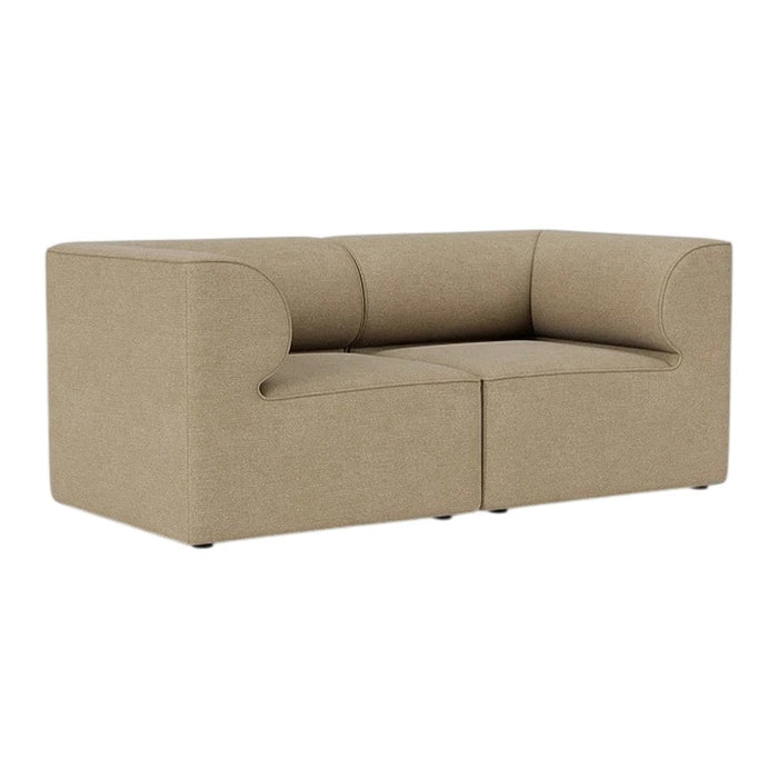 Beige modular couch with smooth, minimalist design and subtle fabric texture, perfect for modern interiors.