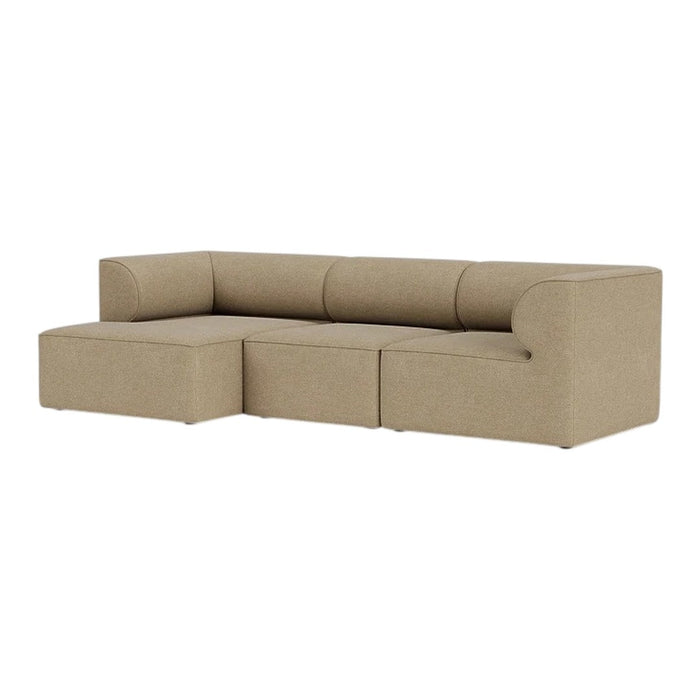 Beige sectional sofa with a simple, modern design and smooth fabric texture, perfect for contemporary living spaces.