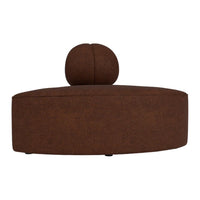 Brown upholstered lounge chair with smooth, rounded shapes and a ball-shaped back cushion for a modern look.