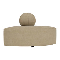 Beige sofa with a rounded shape and a matching spherical cushion, featuring a soft, textured fabric.