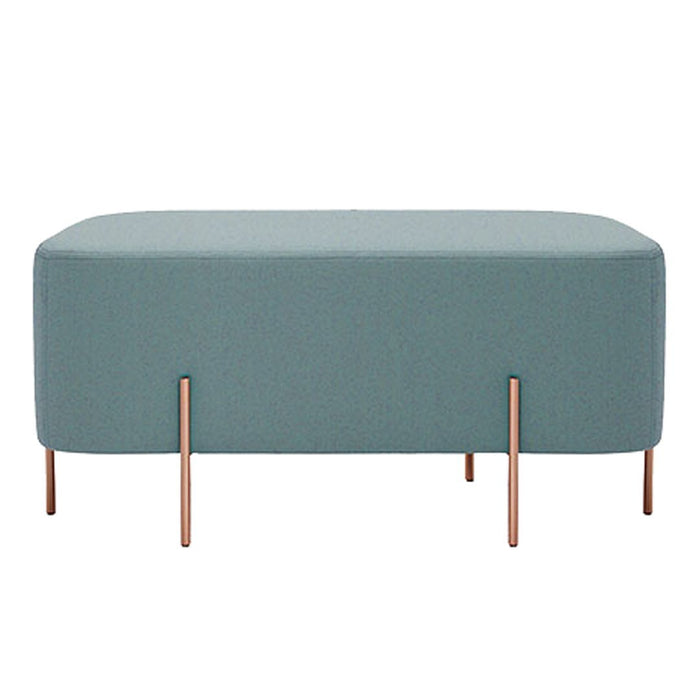 Blue-gray upholstered ottoman with sleek copper legs, featuring a modern minimalist design. Perfect for contemporary decor.