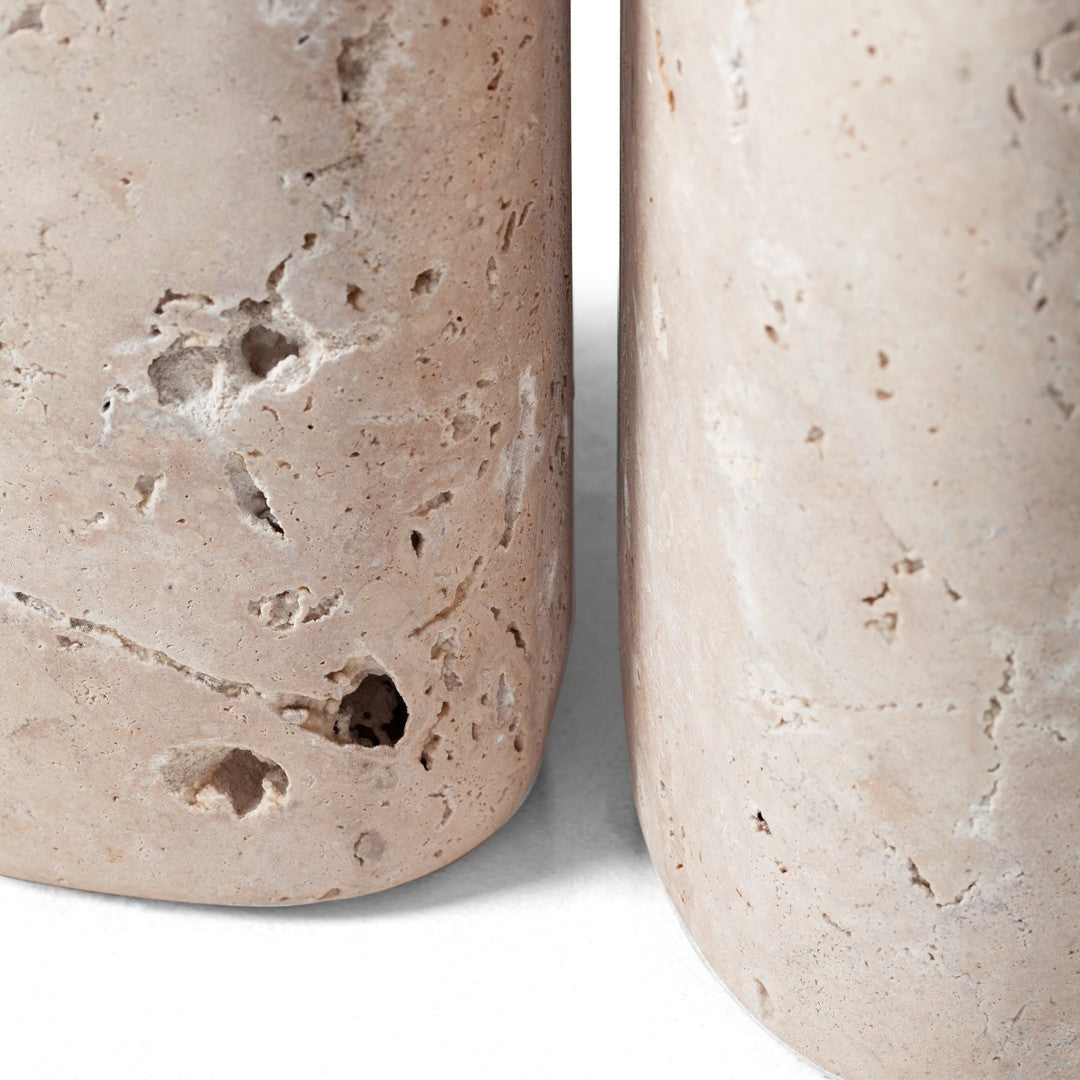 Light beige stone with subtle textures and natural imperfections, featuring smooth and rough patterns.