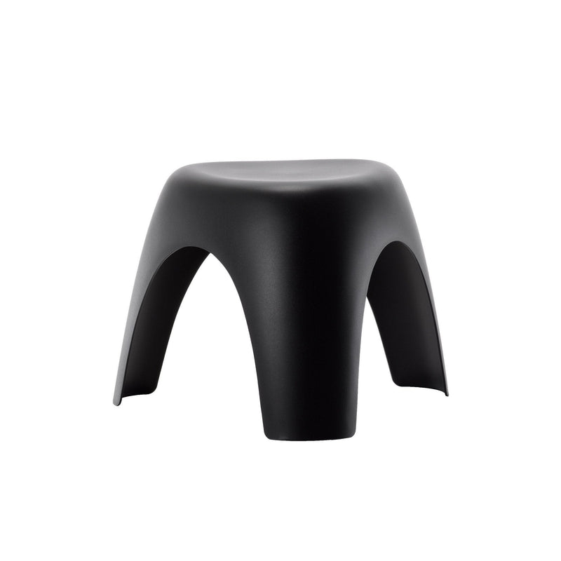 Black minimalist stool with smooth surface and unique arch design, perfect for modern decor.