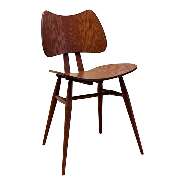 Mid-century wooden chair with a rich walnut finish and a sleek, curved design. Organic shapes and warm tones.