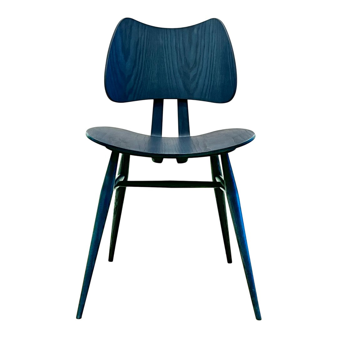 "Elegant blue wooden chair with a sleek design and smooth finish, ideal for modern interiors."