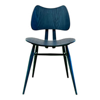"Elegant blue wooden chair with a sleek design and smooth finish, ideal for modern interiors."