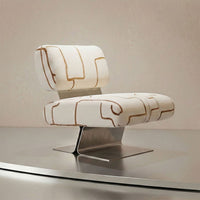 White chair with abstract gold line patterns against a minimalist background. Modern design with sleek metal base.
