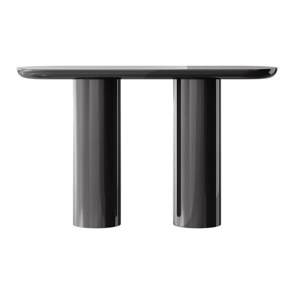 Sleek black glossy table with a smooth top and cylindrical legs, featuring a modern minimalist design.