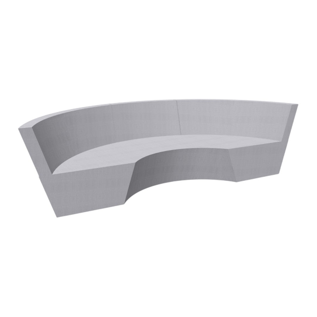 Gray curved sofa with a smooth, minimalist design, featuring clean lines and a contemporary finish.