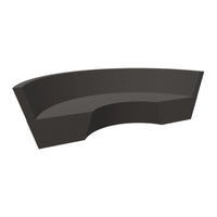 Modern dark gray curved sofa with a smooth finish, perfect for contemporary interiors.