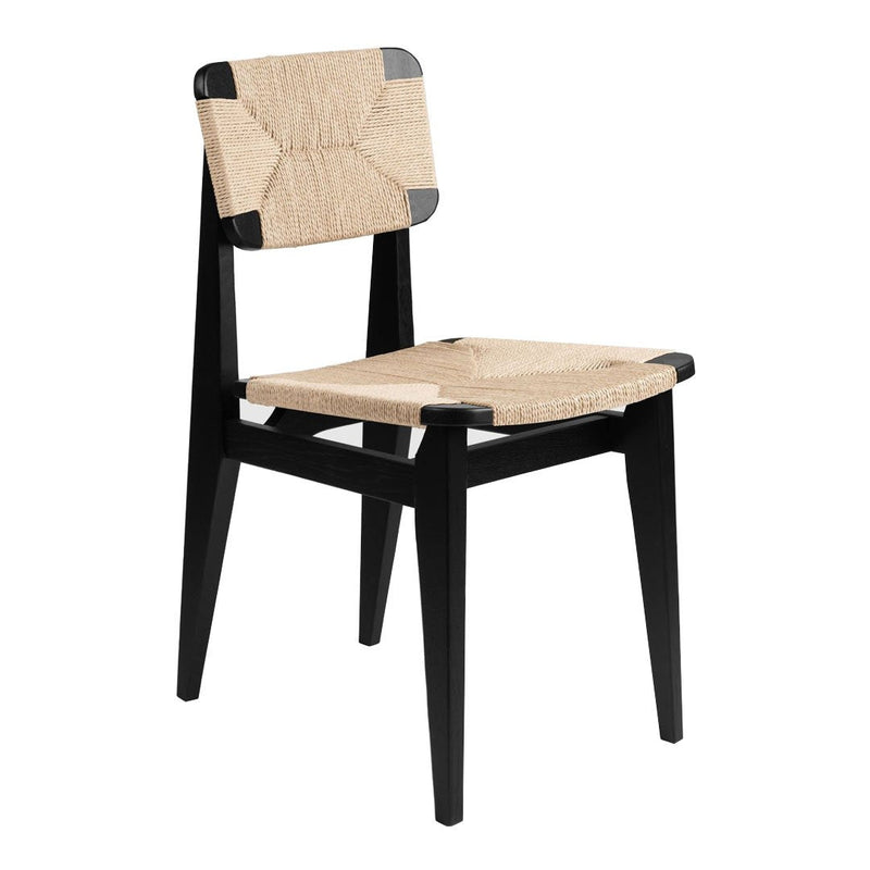 "Black wooden chair with a natural woven seat and back, featuring a simple, modern design and clean lines."