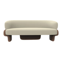 Beige and brown modern curved sofa with a minimalist design, featuring smooth lines and soft, neutral tones.