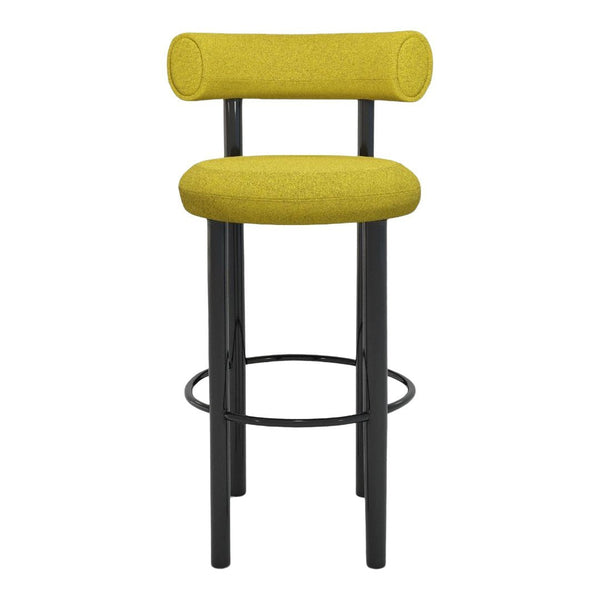 Yellow upholstered bar stool with a modern cylindrical design and black metal legs. Perfect for contemporary spaces.