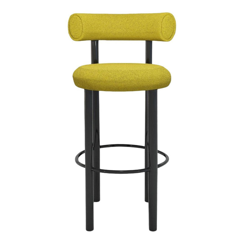 Yellow upholstered bar stool with a modern cylindrical design and black metal legs. Perfect for contemporary spaces.