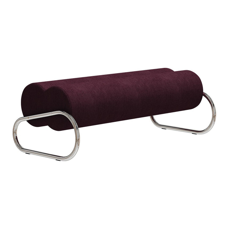 Plush burgundy bench with smooth, rounded forms and sleek chrome legs, adding a modern touch to any space.