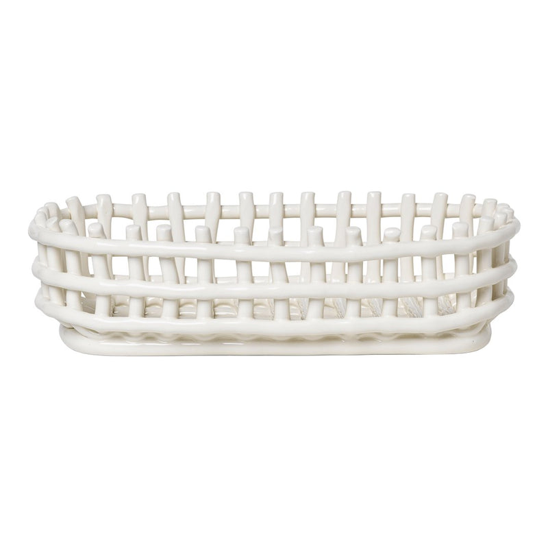 White woven basket with an oval shape and open lattice design, perfect for storage and decor.