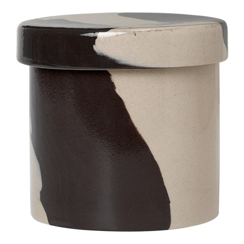 Multicolored ceramic storage jar featuring abstract black, beige, and white patterns and a smooth finish.