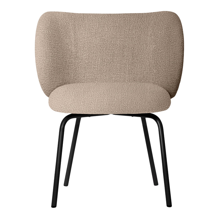 Beige upholstered chair with rounded backrest and black metal legs, showcasing a minimalist design.