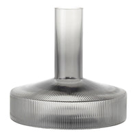 "Smoky gray vase with ribbed texture and a sleek, modern silhouette."
