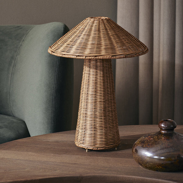 Rattan table lamp with a natural woven texture and earthy tones, enhancing modern decor.