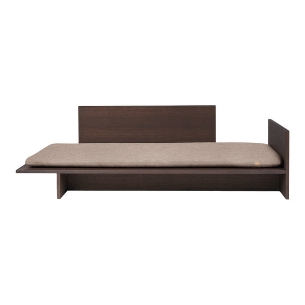Dark brown wooden bed frame with a soft beige mattress, presenting a minimalist and modern design.