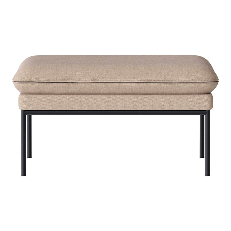 Beige upholstered ottoman with a smooth, minimalist design and black metal legs. Perfect for modern decor.