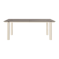 Rectangular dining table with a dark gray top and cream-colored legs. Sleek and modern design.
