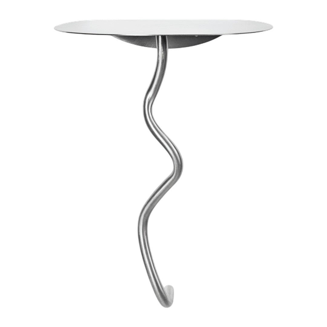 Sleek white tabletop with a unique, twisting silver metal base for an modern accent table.