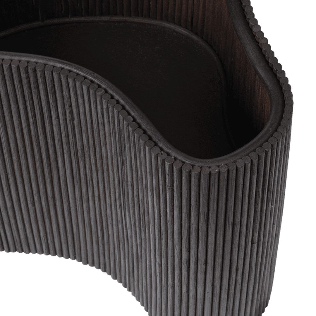 Black textured container with vertical ribbed pattern and smooth curved edges. Modern and sleek design.
